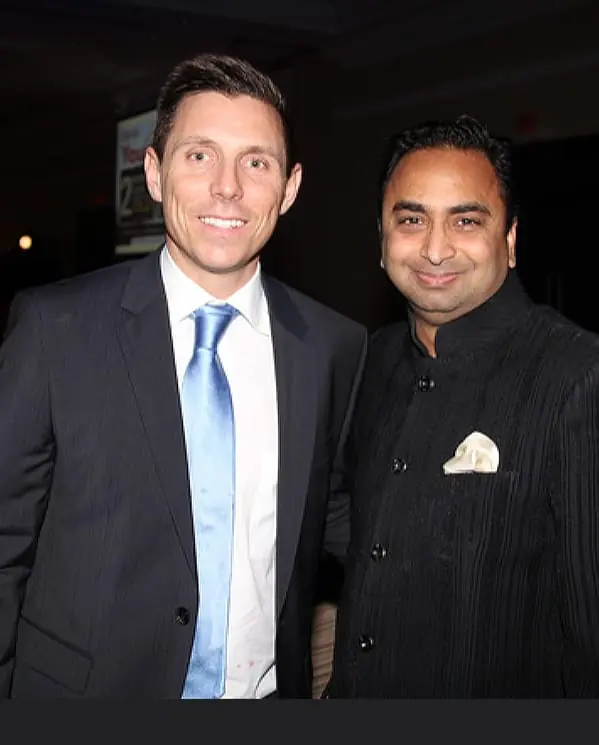 Husain at a community event