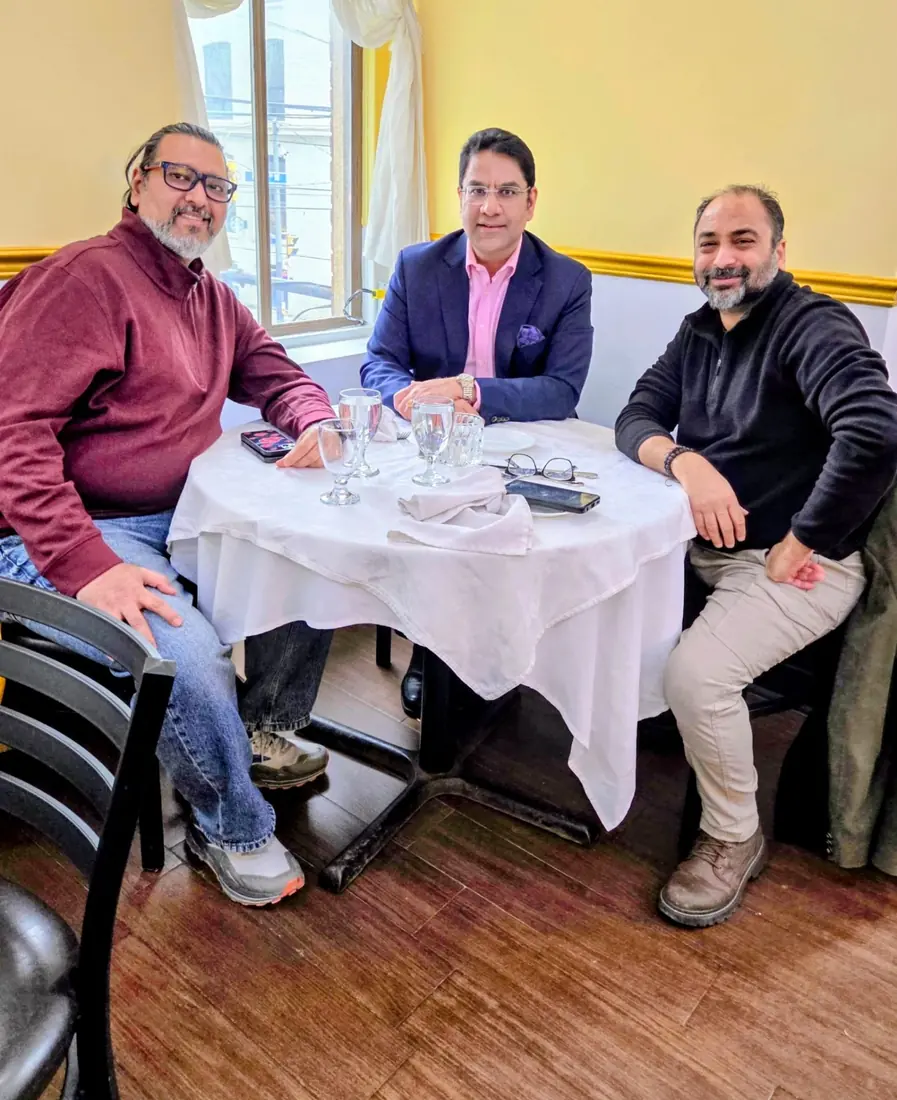 Husain meeting with community members over lunch