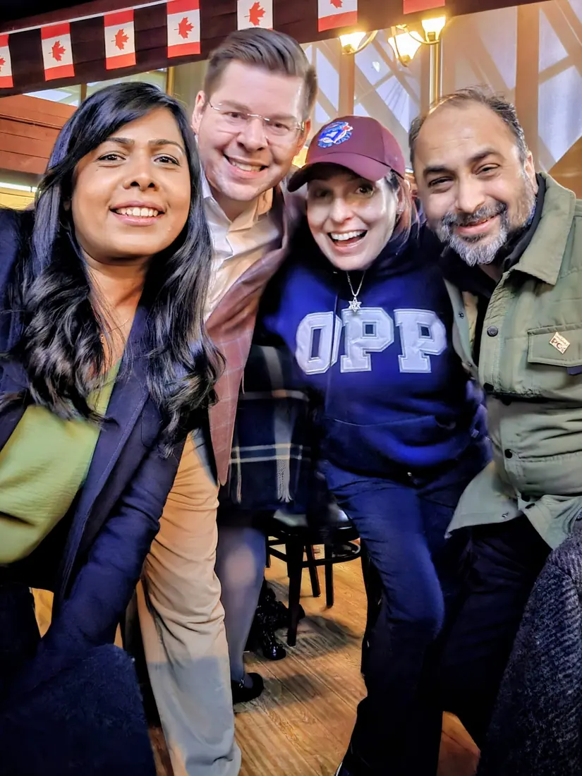 Husain with friends at a Canada Day gathering